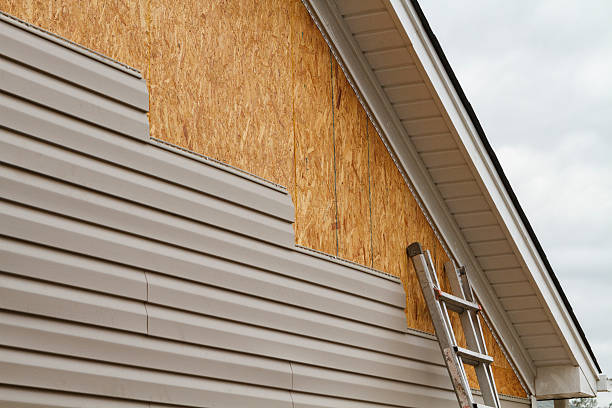 Professional Siding Replacement technician working in Howell, NJ
